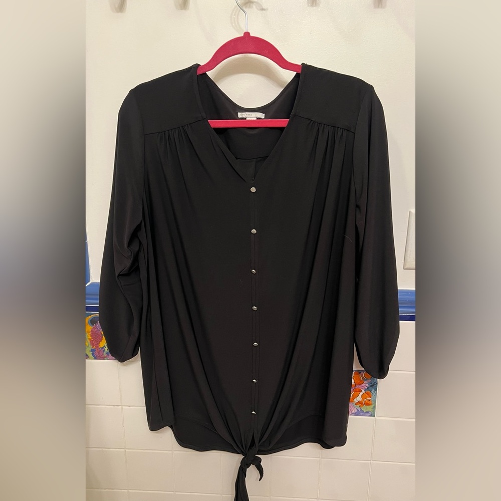 Black plus size top with foe buttons and tie.